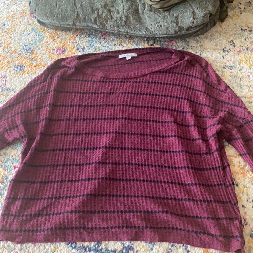 A dark longs sleeve top